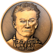 Copper metal coin showing Frazetta portrait, name, and years 1928-2010