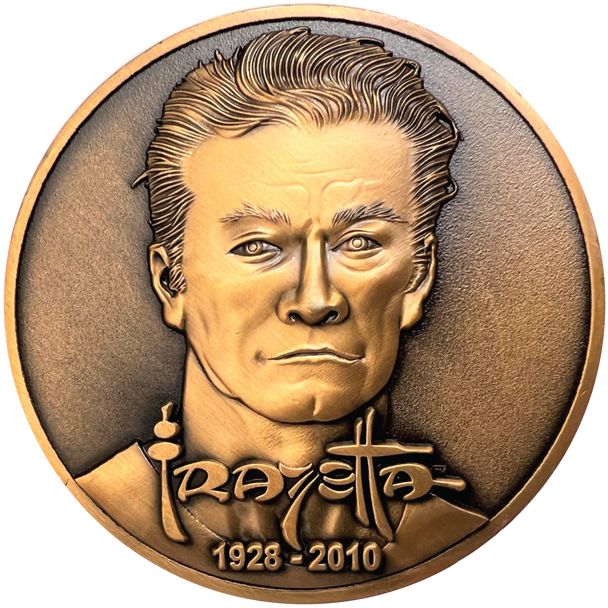 Copper metal coin showing Frazetta portrait, name, and years 1928-2010