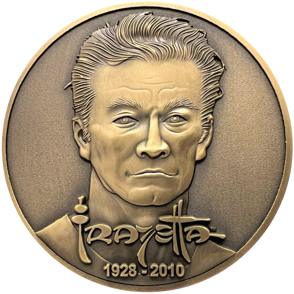 Gold metal coin showing Frazetta portrait with name and years 1928-2010