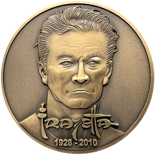 Gold metal coin showing Frazetta portrait with name and years 1928-2010