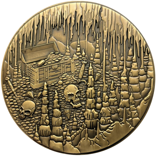 Gold metal coin showing treasure chest, skulls, and cavern