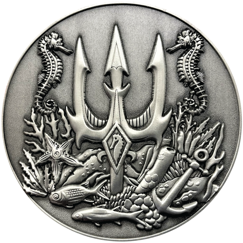 Silver metal coin with trident, seahorses, and fish