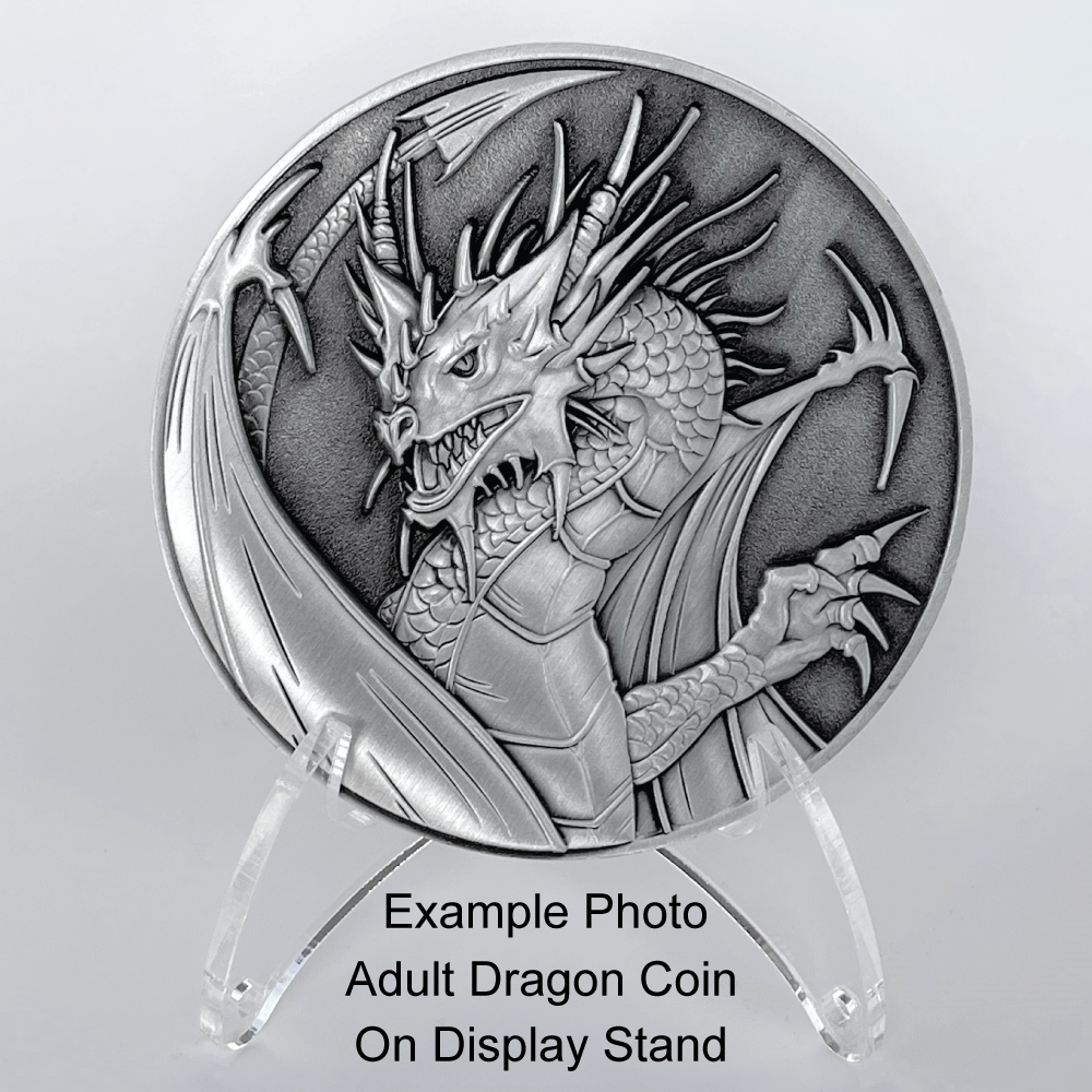 Silver metal coin with dragon on plastic stand