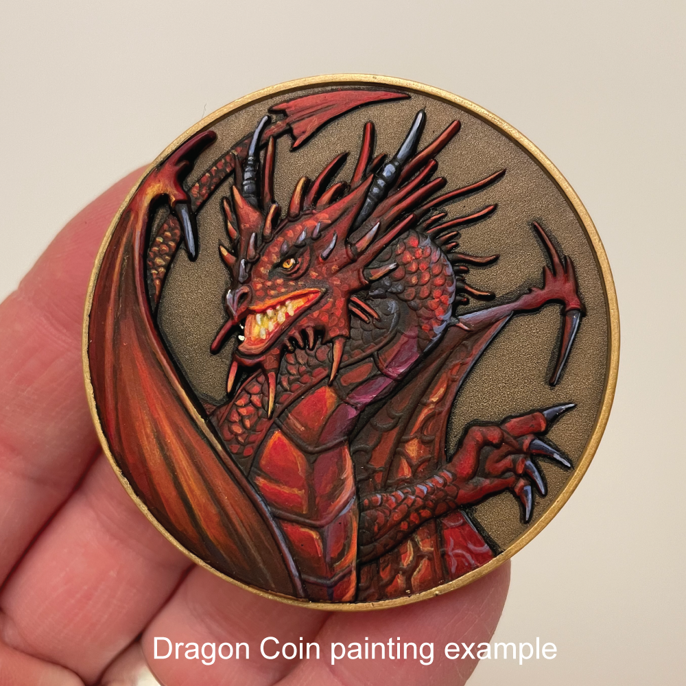 Gold metal coin with red painted dragon held in hand