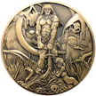 Gold metal coin showing Barbarian