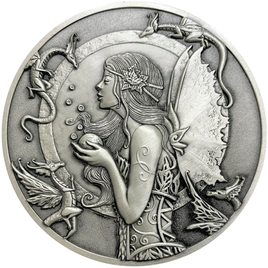 Silver metal coin showing fairy with small dragons around her