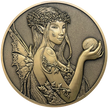 Gold metal coins showing fairy with ball in hand